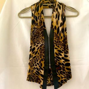 Romeo pour Juliette, Paris - woman’s animal print open back top.